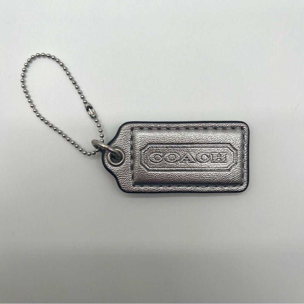 COACH Vintage Metallic Silver Leather Hang Tag